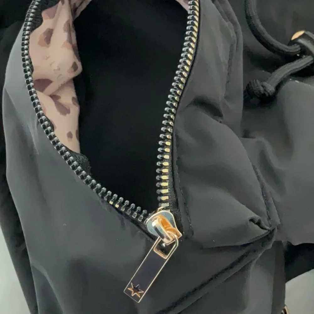 Kenzie black and gold purse - can be worn 3 ways! NWOT!